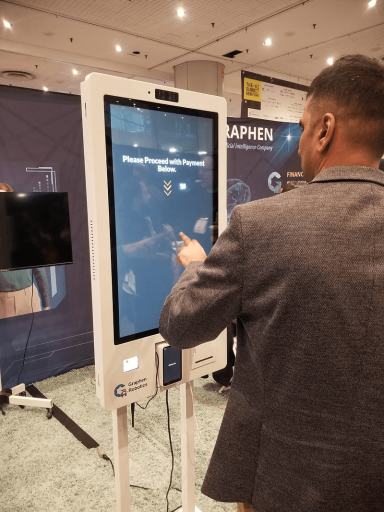 Man pays for food using AI Kiosk